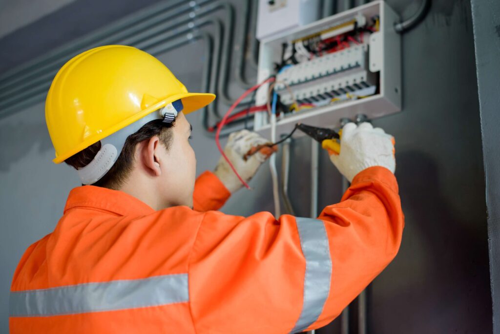 electrical wiring technician crimping wires